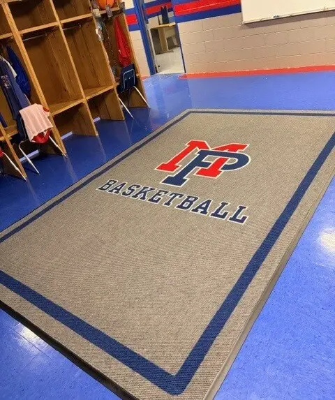 Personalized sports team locker room mat with team logo colors and mascot