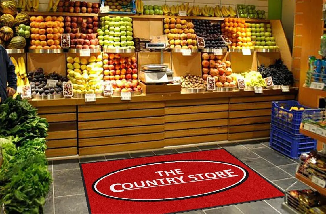 Design rendering of a custom country store logo rug at a retail store entrance