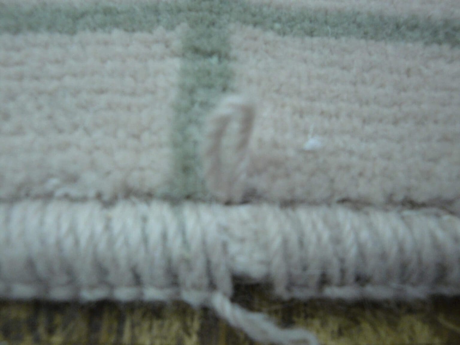 What is the Difference Between Binding & Serging an Area Rug - Rug Rats
