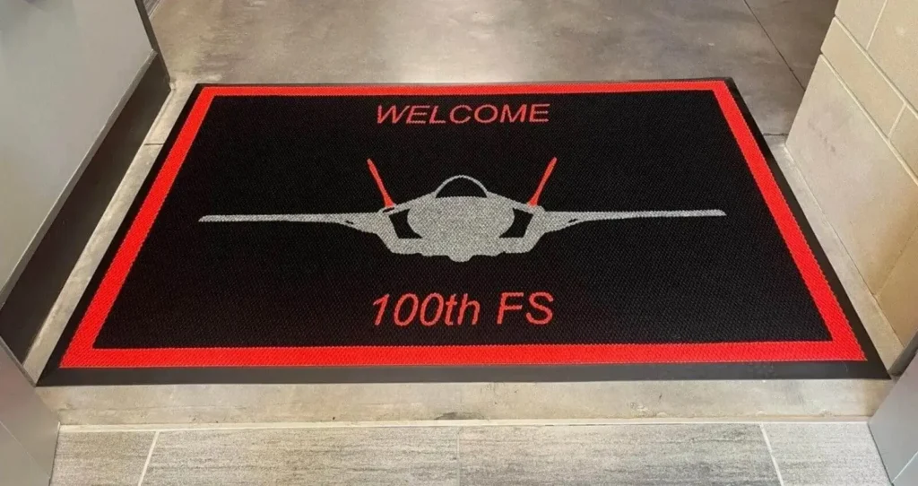 Piazza hand-inlaid custom logo mat with solid-color carpet fibers by Rug Rats — premium sanctuary and upscale lobby choice